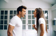 © millenius - Aggressive married couple, man and woman shouting at each other. Relationship crisis concept. Generated by AI