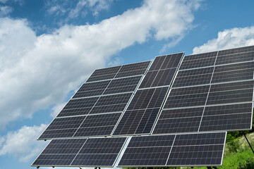 Wall Mural - Photovoltaic solar panel as alternative electricity source against blue sky