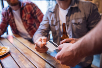 Wall Mural - Friends at the pub