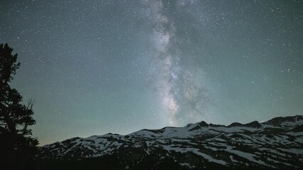 Wall Mural - beautiful time lapse of mountains with the stars moving across the night sky. shot in the sierra nev