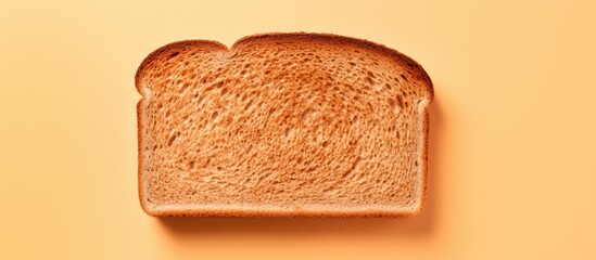 Poster - Top view of whole wheat bread on a isolated pastel background Copy space Image of sliced bread Clipping path included