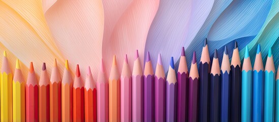 Poster - Closeup of colored pencils on a isolated pastel background Copy space suitable for office school or art settings