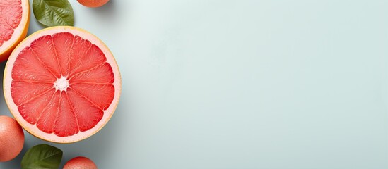 Wall Mural - Grapefruit on a isolated pastel background Copy space with clipping path
