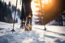 Man's legs in mountain skis and ski poles on the snow. Blurry mountains on the background. Generative AI