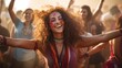 Indian young woman (30) dancing with zeal at a music festival, her moves capturing the vibrant moment