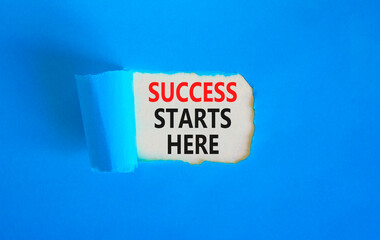 Wall Mural - Success starts here symbol. Concept word Success starts here on beautiful white paper. Beautiful blue table blue background. Business motivational success starts here concept. Copy space.
