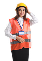 Sticker - Female worker in vest and hardhat on white background