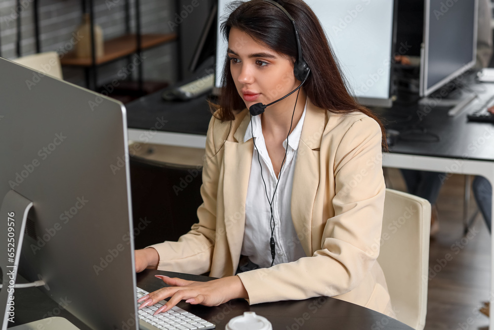Female technical support agent  working in office
