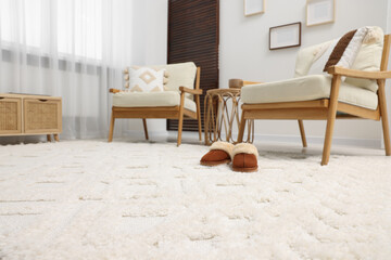 Poster - stylish living room with soft white carpet and furniture, low angle view. interior design