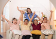 © Wosunan - Group of Asian senior and caregiver having fun in the nursing home.