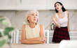 © JackF - Quarrel of an elderly mother and adult daughter at home. Adult daughter is unhappy with elderly mother