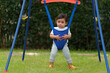 infant baby jumping in jumper swing