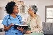 Bible, religion and assisted living caregiver with an old woman in a retirement home together. Healthcare, christian faith or belief with a nurse or volunteer reading to a senior patient in a house
