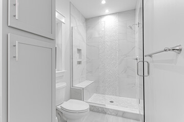 Wall Mural - Clean Modern Primary Bathroom Glass Shower with Tile Walls and Grey Cabinetry. Stone Bench with Built In Shelves