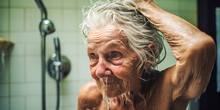 Touching portrayal of an independent, elderly man with beard, washing his hair alone in the shower reflecting personal hygiene struggles among aged population.