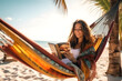 Relaxed young woman reading book while lying in hammock outdoor on tropical beach