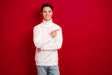 Sticker - Photo of smiling brunet hair christmas guy wear white sweater recommend join new vacancy big successful company isolated on red color background