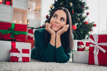 Sticker - Photo of dreamy pretty lady dressed knitted x-mas sweater thinking lying floor arms cheeks indoors house room