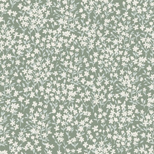 Seamless Pattern With Simple White Flowers And Light Green Leaves On Long Stems. Cute Spring Floral Print With Painted Small Flowers And Leaves On A Light Green Background.