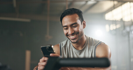 Poster - Happy asian man, phone and fitness on break in social media, communication or networking at gym. Active male person smile for online texting or chatting on mobile smartphone app at indoor health club