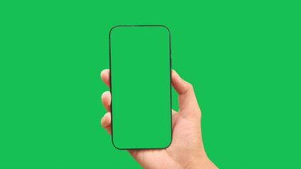 Hands holding smartphone with green screen in green background vertical green 