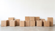 © kichigin19 - a row of cardboard boxes against a white wall, relocation.