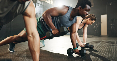 Wall Mural - Gym group, dumbbell and rowing exercise for power, muscle challenge and action in workout class. Serious black man, strong bodybuilder and push up with heavy weights for fitness of healthy training