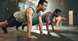 © Felix/peopleimages.com - Gym, group fitness and push up exercise for power, sports challenge and muscle on ground. Serious asian man, bodybuilder and performance training on floor with friends, workout class or strong people