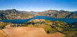 Panoramic aerial view of Serre-Poncon lake with Le Sauze-du-Lac village. Durance Valley in summer. Hautes-Alpes (Alps), France