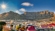 © poco_bw - table mountain in cape town, aerial view over residential neighborhood, at sunset