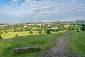 Wall Mural - Wooden bench with the city in the background, Bristol, England, United Kingdom