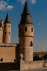 Poster - Part of the historic Alcazar Castle against a clear sky, Segovia, Spain