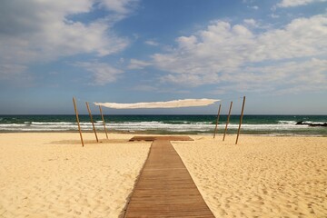 Poster - Panoramic shot of a Mediterranean beach with blue sky on the background on the island of Cyprus