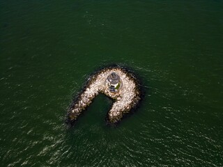 Canvas Print - Aerial view of the Orient Point lighthouse out on Long Island, New York on a sunny day