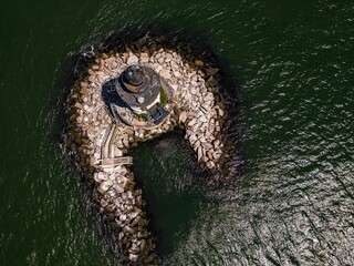 Wall Mural - Aerial view of the Orient Point lighthouse out on Long Island, New York on a sunny day