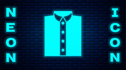 Sticker - Glowing neon Shirt icon isolated on brick wall background. T-shirt. Vector