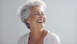 Beautiful, gorgeous 50s mid age beautiful elderly senior model woman laughing and smiling. Close up portrait. Healthy face skin care beauty.