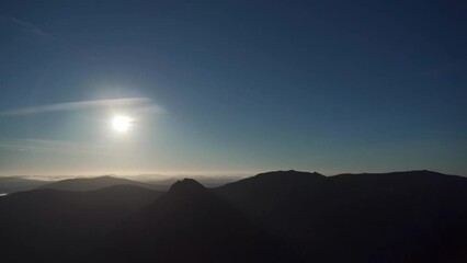 Wall Mural - A blue sky over the mountains of Snowdonia in Wales UK