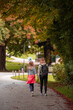© gljivec - Mother and daughter are walking in autumn time.