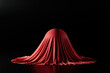 Mysterious round object covered by red cloth. 3d illustration of secret object over black background