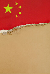 Wall Mural - China flag background on torn wallpaper