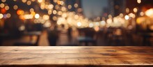 Blurred Christmas Background And Wooden Table In Caf Or Restaurant For Product Display Or Montage