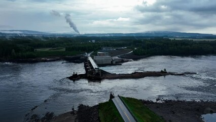 Wall Mural - Drone over destroyed asphalt road on water and the other side of the bridge with gray sunset sky