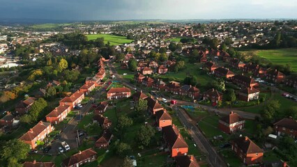 Wall Mural - A drone's-eye view captures Dewsbury Moore Council estate's fame, a typical UK urban council-owned housing development with red-brick terraced homes and the industrial Yorkshire