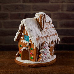 Wall Mural - Christmas gingerbread house decorated with sugar icing and colorful candy