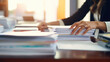 © Cedric - Businesswoman hands working in stacks of paper searching for information