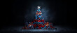 Blue and red Christmas tree in the center of the image with presents stacked all around. Dark snowy background