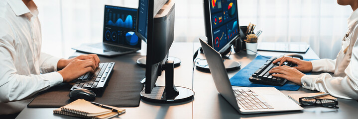 Poster - analyst working on data analysis or bi dashboard on computer monitor. business team analyzing financ