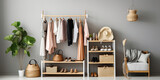 Fototapeta  - Rack with bright stylish clothes, shoes and accessories near light grey wall indoors