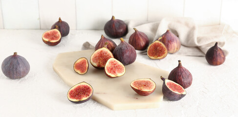 Wall Mural - Fresh ripe figs on light table
